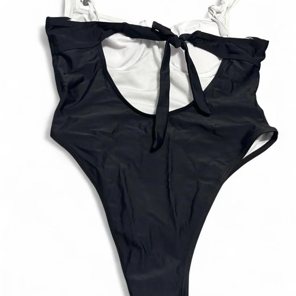 Classic vintage-inspired black and white one-piece swimsuit sz large